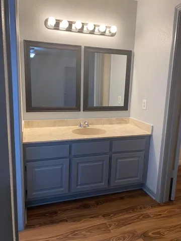 a close view of sink and mirror