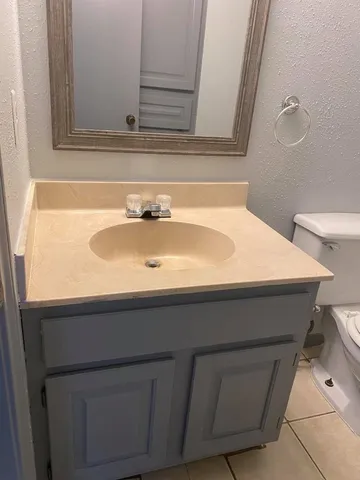a bathroom with a toilet and a bathtub