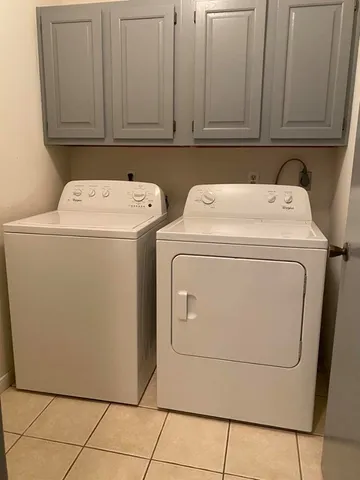 a view of a backyard with a garden and plants