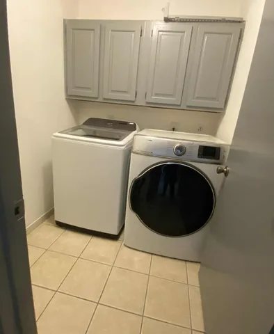 a view of a backyard with a garden and plants