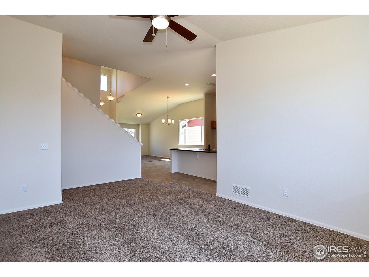 2304 Sublime Drive Windsor, CO 80550 - Photo 26 of 39 a view of a big room with wooden floor