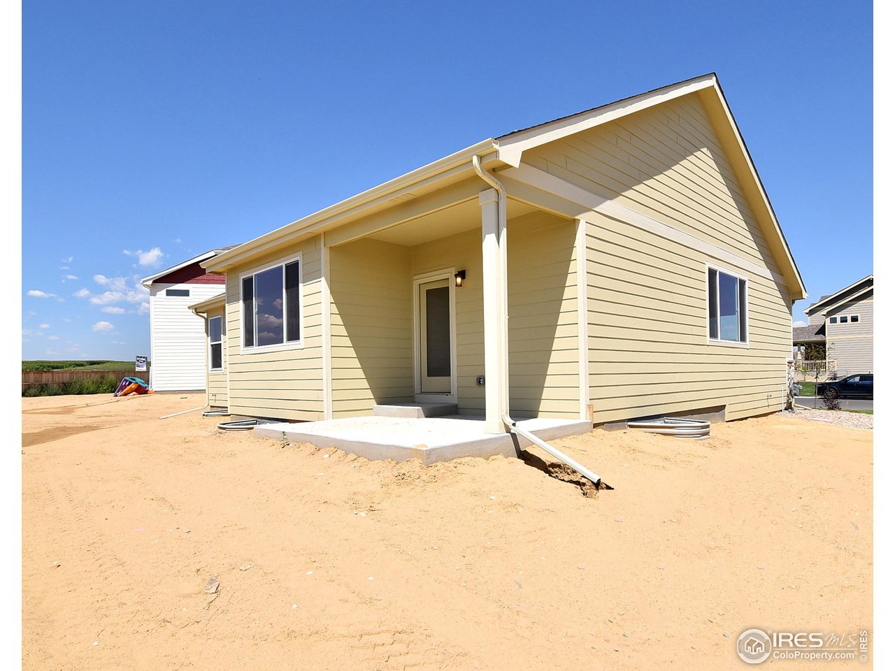 2304 Sublime Drive Windsor, CO 80550 - Photo 39 of 39 a view of a house with snow on the road