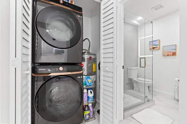 a utility room with dryer and washer
