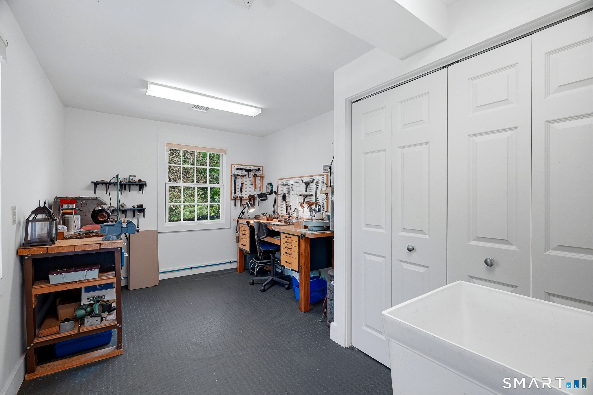 118 Bill Hill Road Lyme, CT 06371 - Photo 25 of 38 The workshop. Great all purpose space and mudroom area.