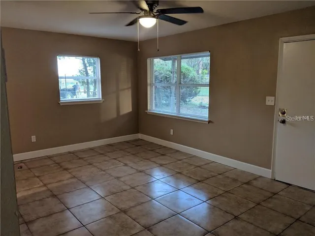 a view of an empty room and window