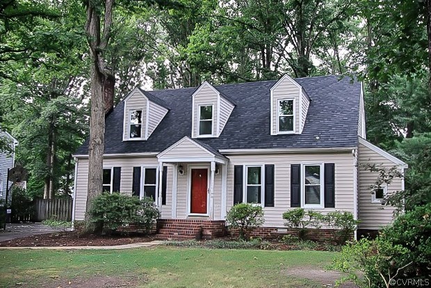 front view of a house with a yard