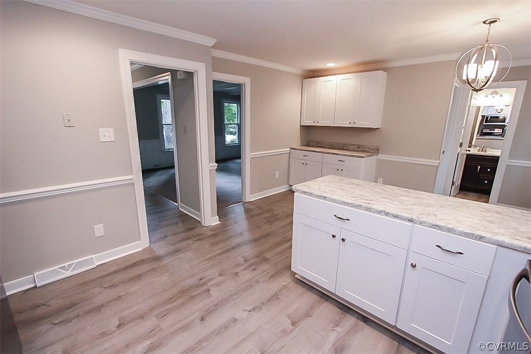 11201 Rockledge Road North Chesterfield, VA 23235 - Photo 8 of 25 a spacious bathroom with a granite countertop sink and a mirror