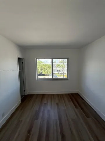a bathroom with a sink a toilet and bathtub