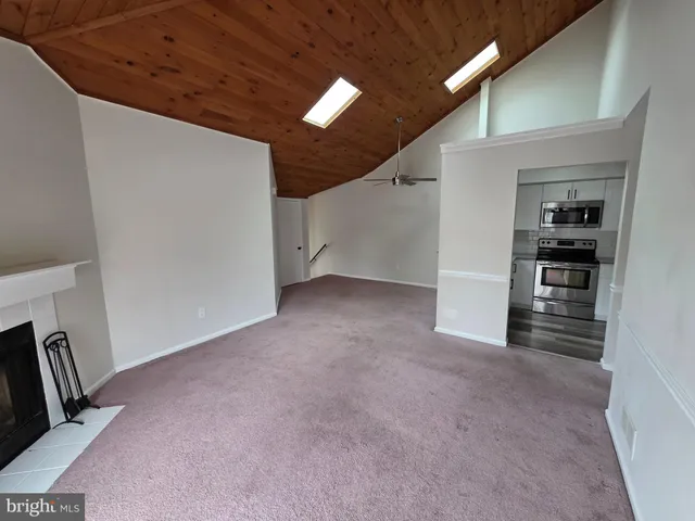 a kitchen with a stove and a sink