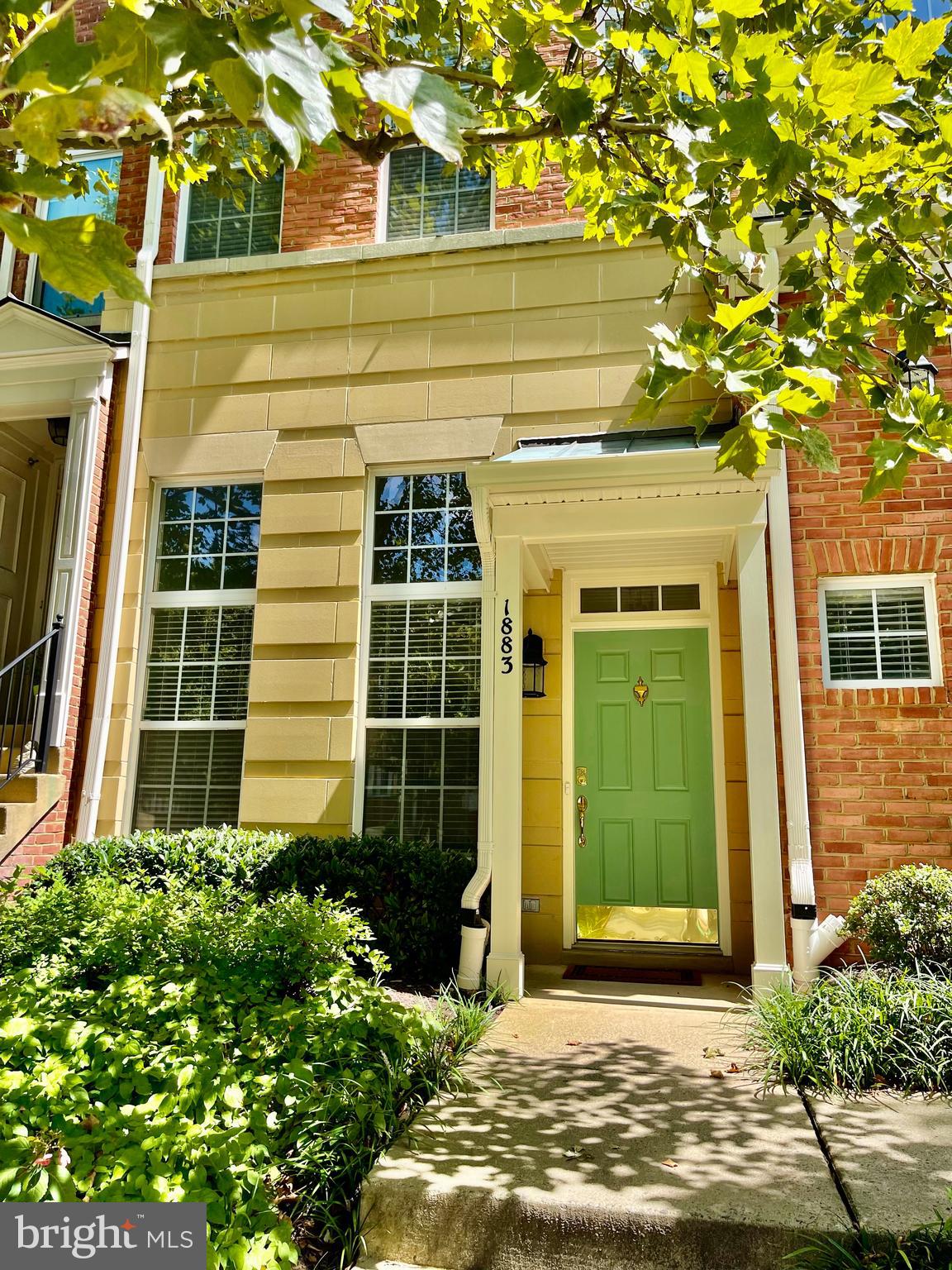 1883 Crescent Park Drive, Unit 112A Reston, VA 20190 - Photo 2 of 23 a view of a entrance front of the house