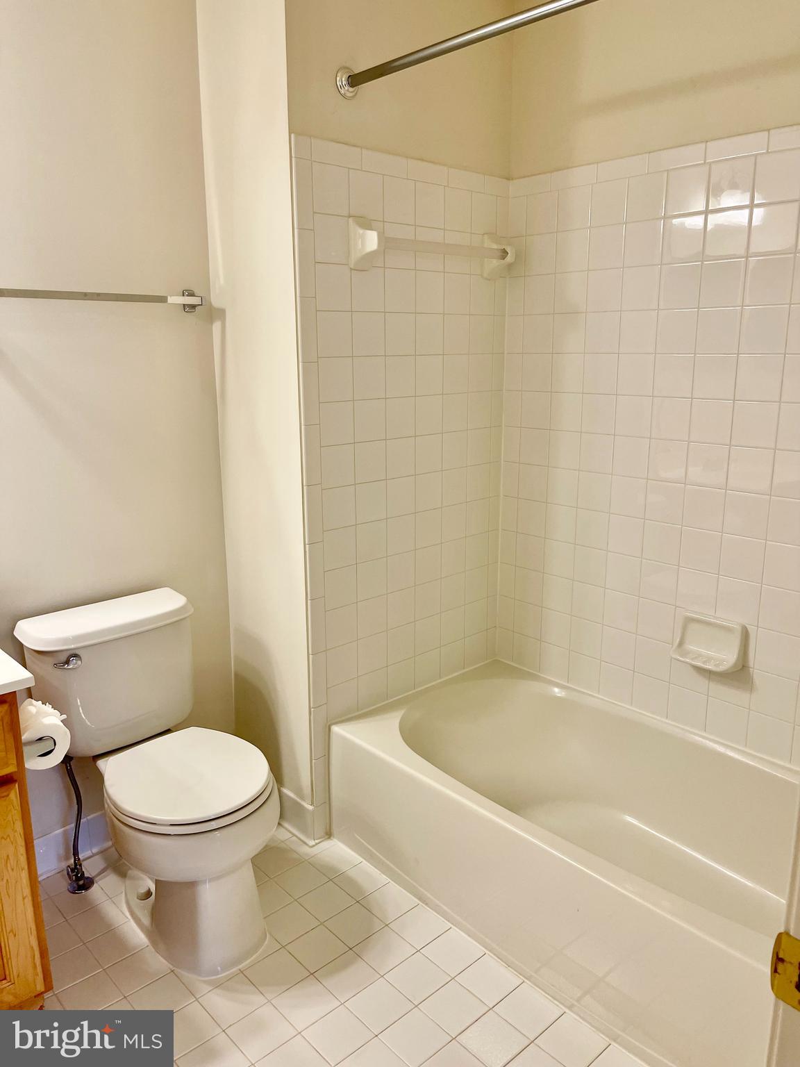 1883 Crescent Park Drive, Unit 112A Reston, VA 20190 - Photo 22 of 23 a bathroom with a toilet and a shower