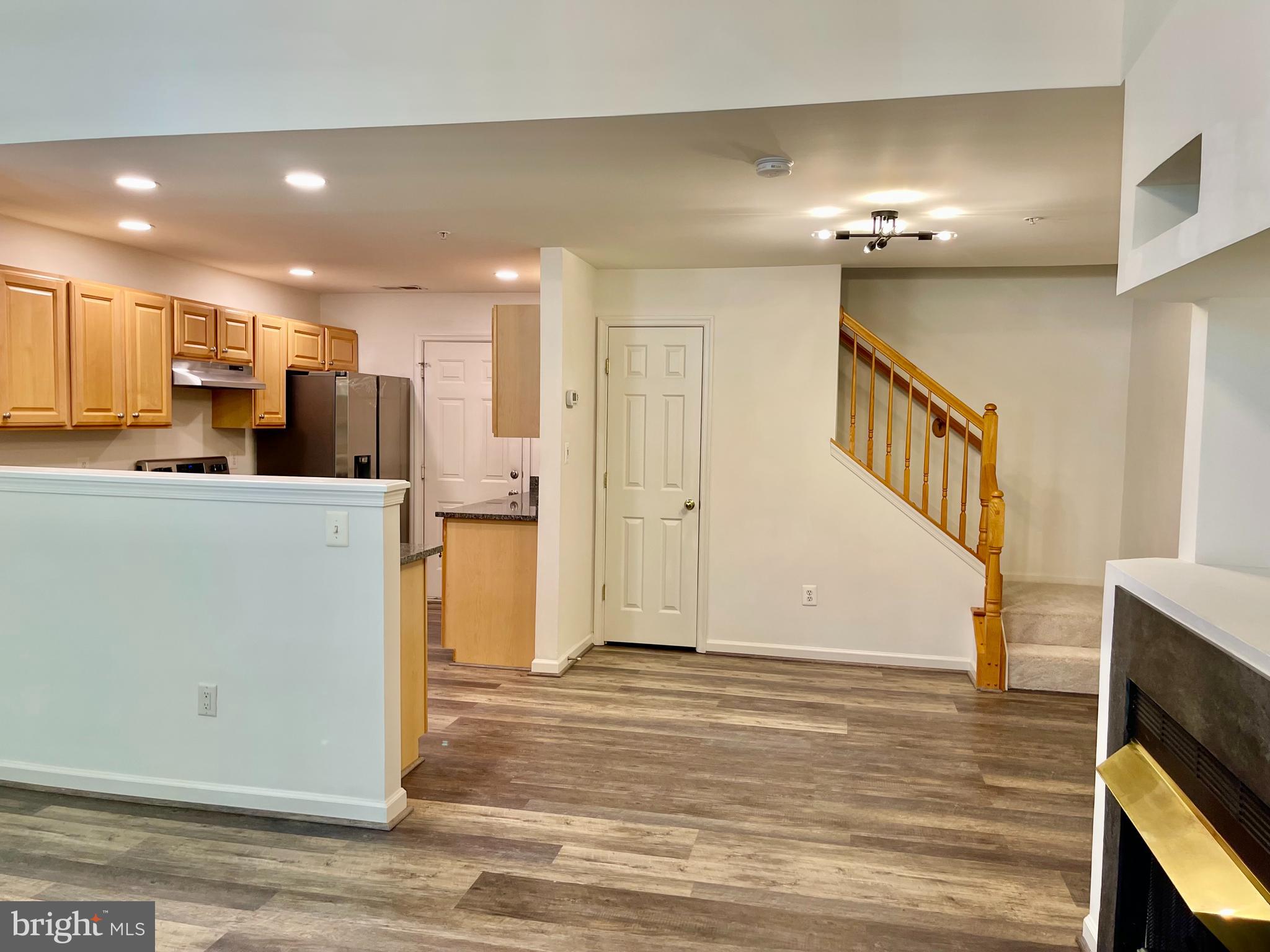 1883 Crescent Park Drive, Unit 112A Reston, VA 20190 - Photo 6 of 23 a view of a kitchen and a window