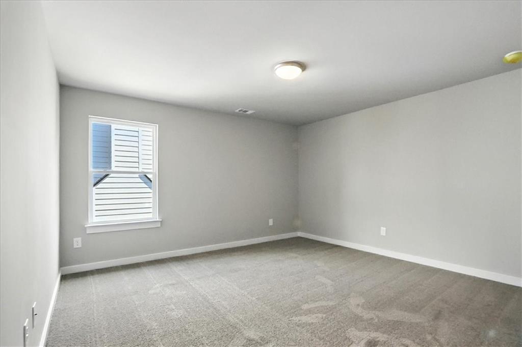 4034 Links Boulevard Jefferson, GA 30549 - Photo 48 of 68 an empty room with windows