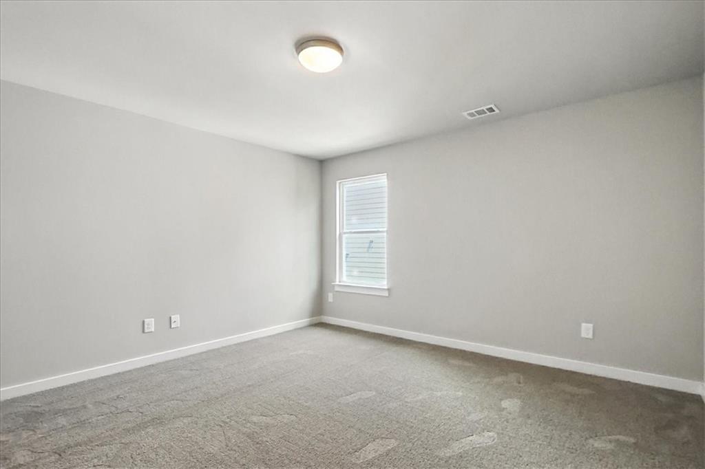 4034 Links Boulevard Jefferson, GA 30549 - Photo 50 of 68 an empty room with a window