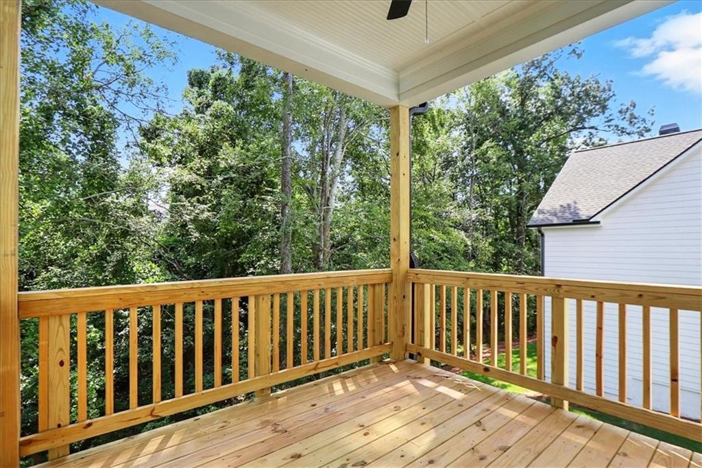 4034 Links Boulevard Jefferson, GA 30549 - Photo 52 of 68 a view of a wooden street from a balcony
