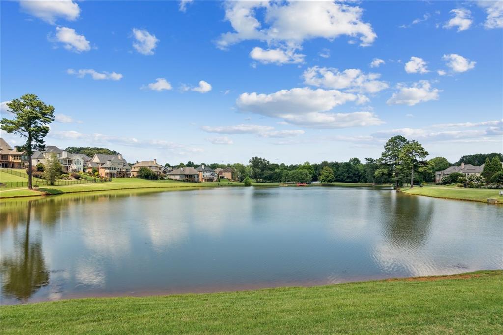 4034 Links Boulevard Jefferson, GA 30549 - Photo 64 of 68 a view of a lake with houses in the back