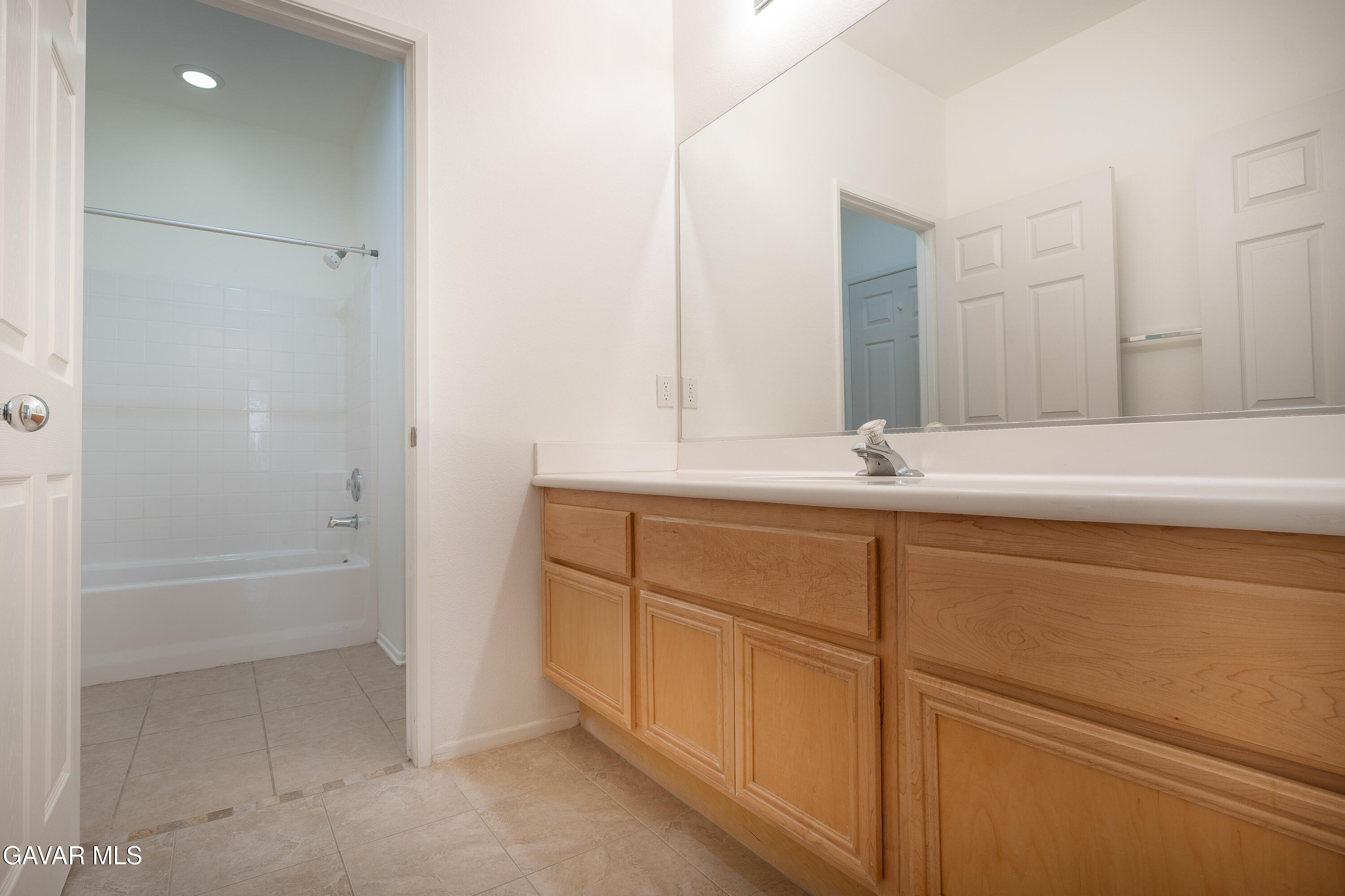 40263 Preston Road Palmdale, CA 93551 - Photo 22 of 24 a bathroom with a bathtub and a sink