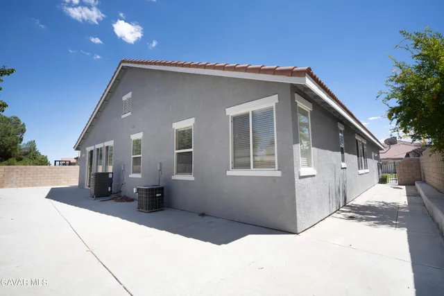 a view of a house with a patio