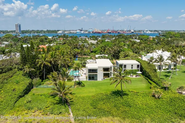 a view of multiple houses with a yard