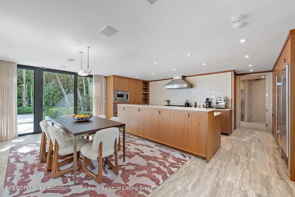 a bathroom with a sink a mirror and a bathtub