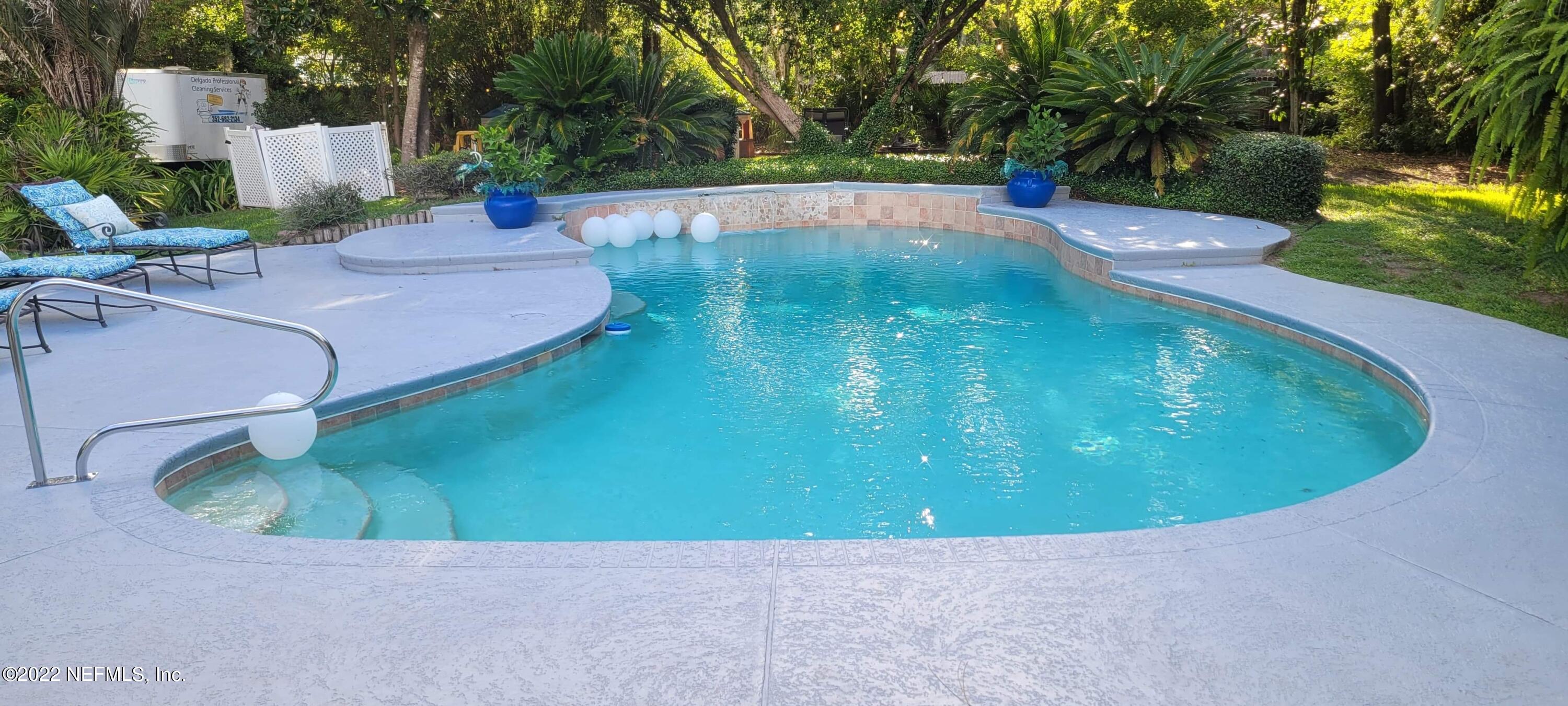 6044 West Shores Road Fleming Island, FL 32003 - Photo 1 of 18 a view of a backyard