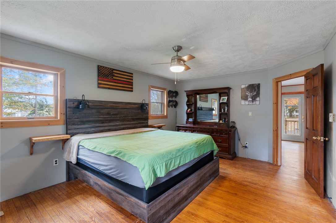 7779 Brown Road Wolcott, NY 14590 - Photo 11 of 37 SO MUCH room in this primary bedroom with the FULL