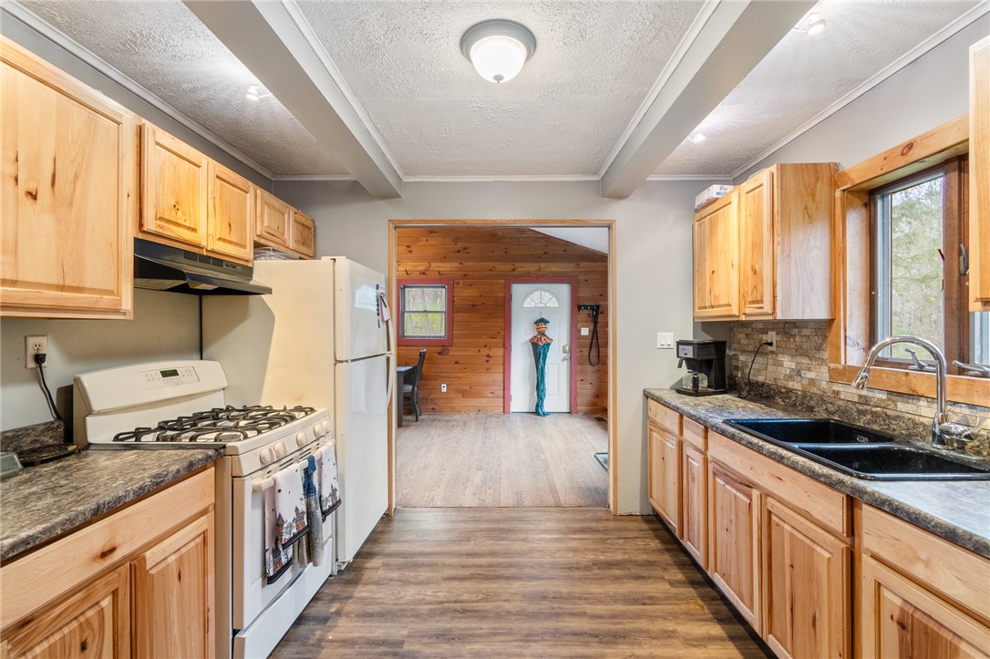 7779 Brown Road Wolcott, NY 14590 - Photo 15 of 37 The kitchen view shows the DOOR TO THE DECK- imagi