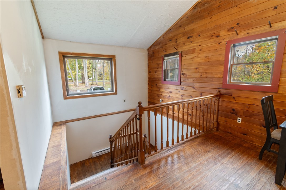 7779 Brown Road Wolcott, NY 14590 - Photo 19 of 37 Let’s head down to the FINISHED lower level! A fam