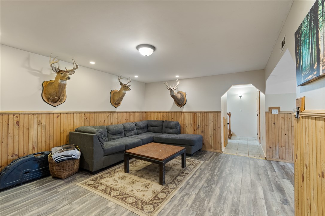 7779 Brown Road Wolcott, NY 14590 - Photo 20 of 37 The LOWER LEVEL family room- there’s two bedrooms