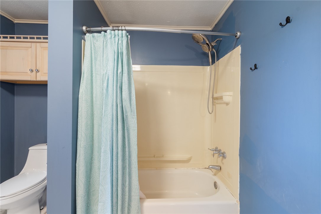 7779 Brown Road Wolcott, NY 14590 - Photo 25 of 37 The full bath tub and shower