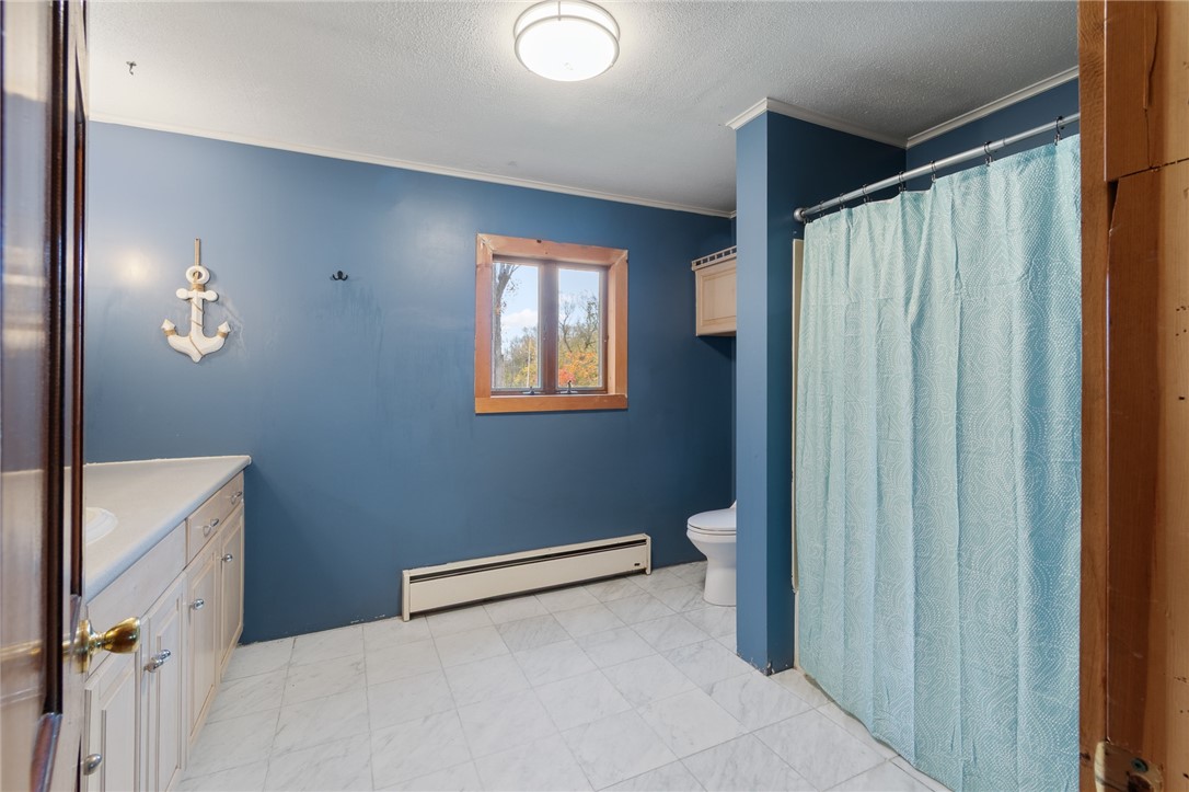 7779 Brown Road Wolcott, NY 14590 - Photo 26 of 37 The first floor FULL BATH