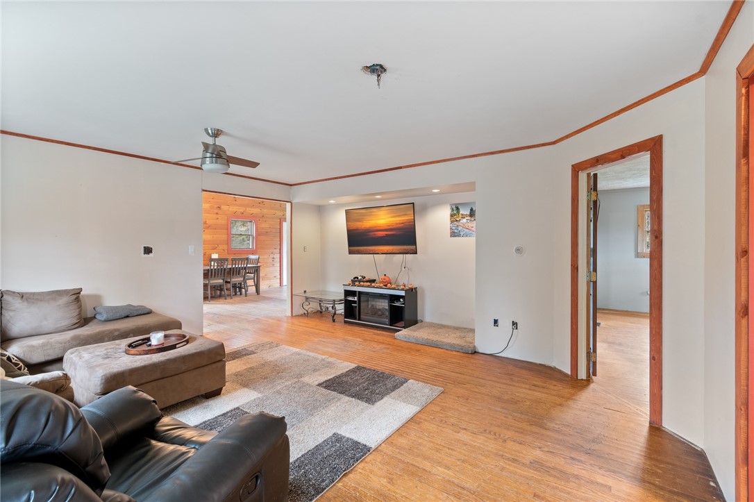 7779 Brown Road Wolcott, NY 14590 - Photo 8 of 37 The FIRST FLOOR LIVING ROOM- the bedroom and full