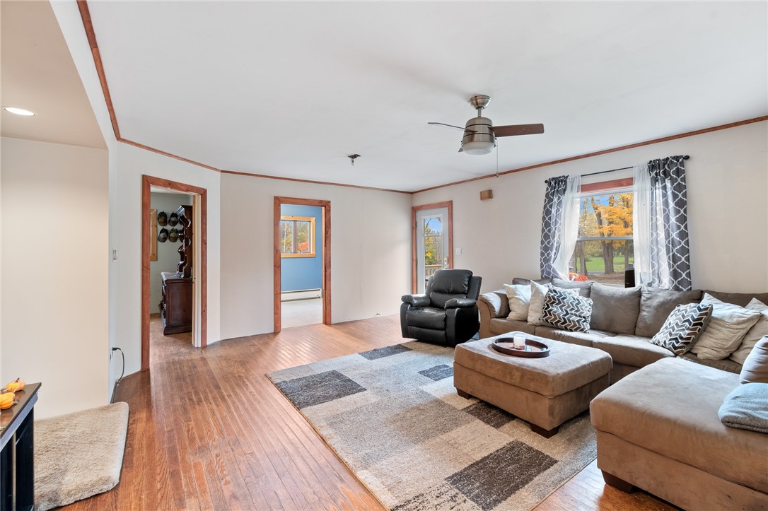 7779 Brown Road Wolcott, NY 14590 - Photo 9 of 37 The BRIGHT and OPEN LIVING ROOM on the first level