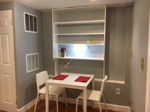 102 Moreland Street Boston, MA 02119 - Photo 8 of 31 a view of a dining room with furniture
