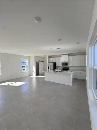 an empty room with windows