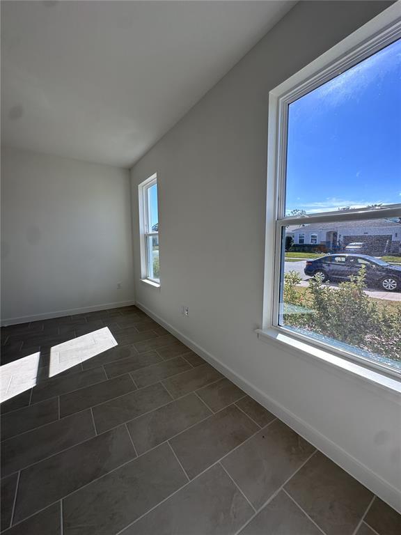 2059 Iorio Street St. Cloud, FL 34771 - Photo 21 of 61 a view of an empty room and window