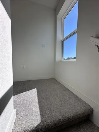 a white bath tub sitting in a bathroom