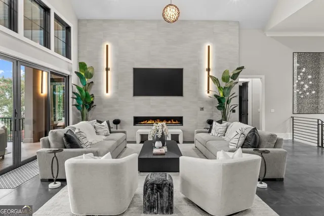 a large white kitchen with a large window