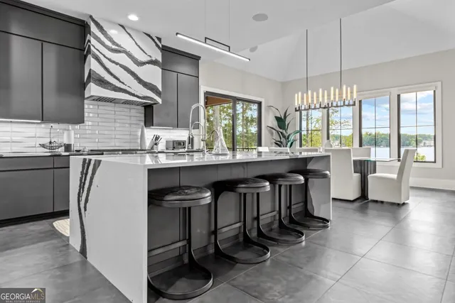 a room with furniture and flat screen tv