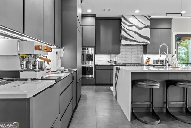 a bedroom with furniture and a flat screen tv