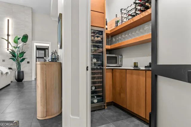 a kitchen with sink and cabinets