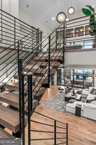 a reading room with furniture and book shelf