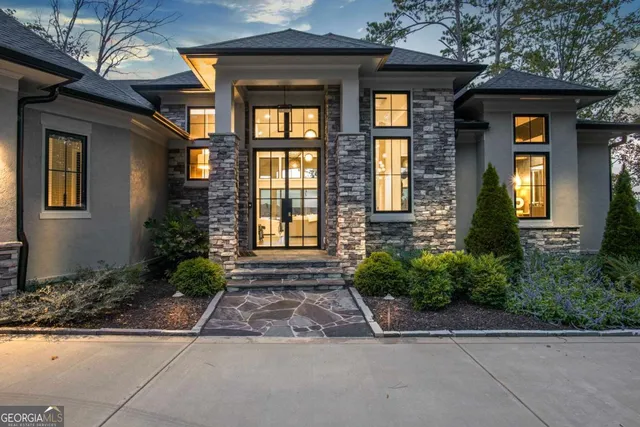 a living room with fireplace furniture and a flat screen tv