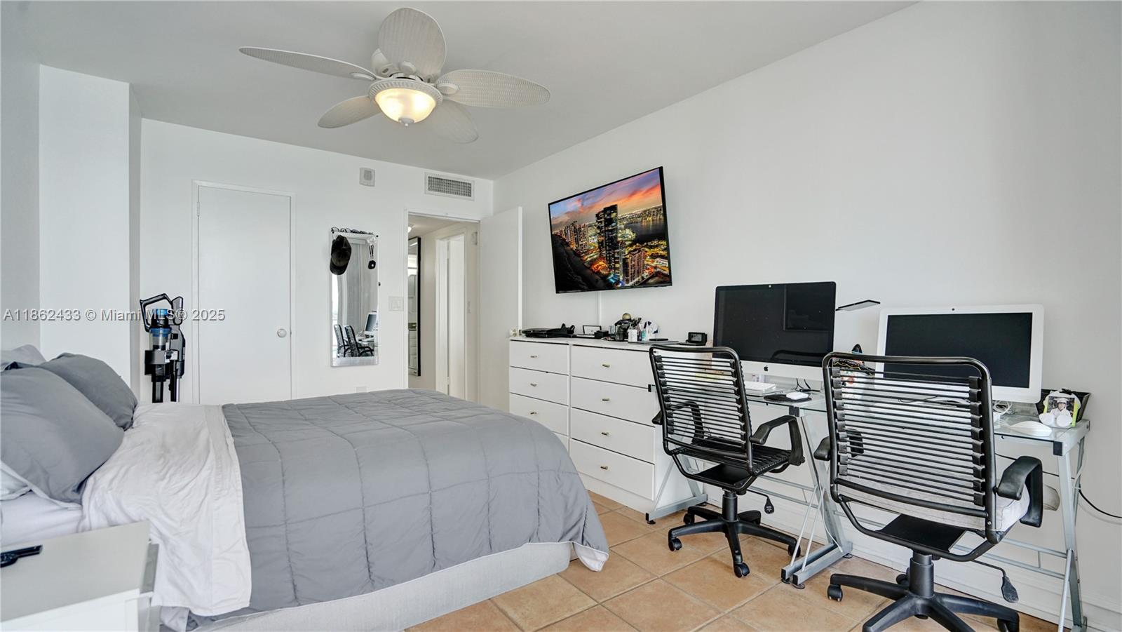 1228 West Avenue, Unit 201 Miami Beach, FL 33139 - Photo 23 of 42 a view of a livingroom with workspace and a couch