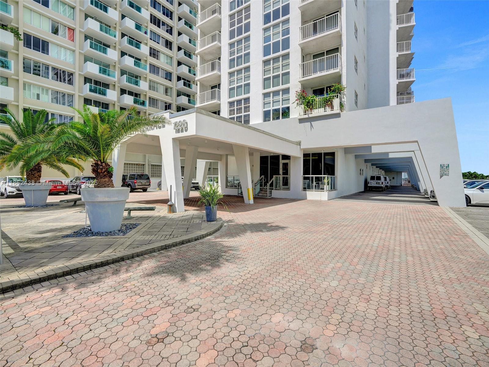 1228 West Avenue, Unit 201 Miami Beach, FL 33139 - Photo 36 of 42 a view of building with outdoor space