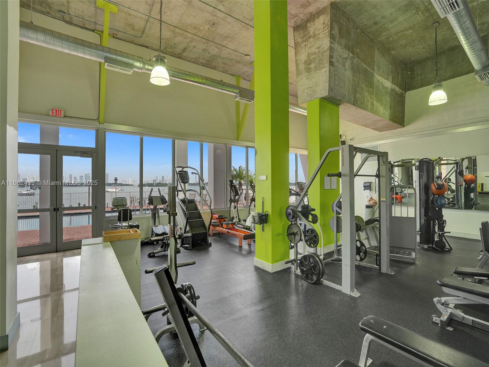 1228 West Avenue, Unit 201 Miami Beach, FL 33139 - Photo 38 of 42 a view of a room with gym equipment