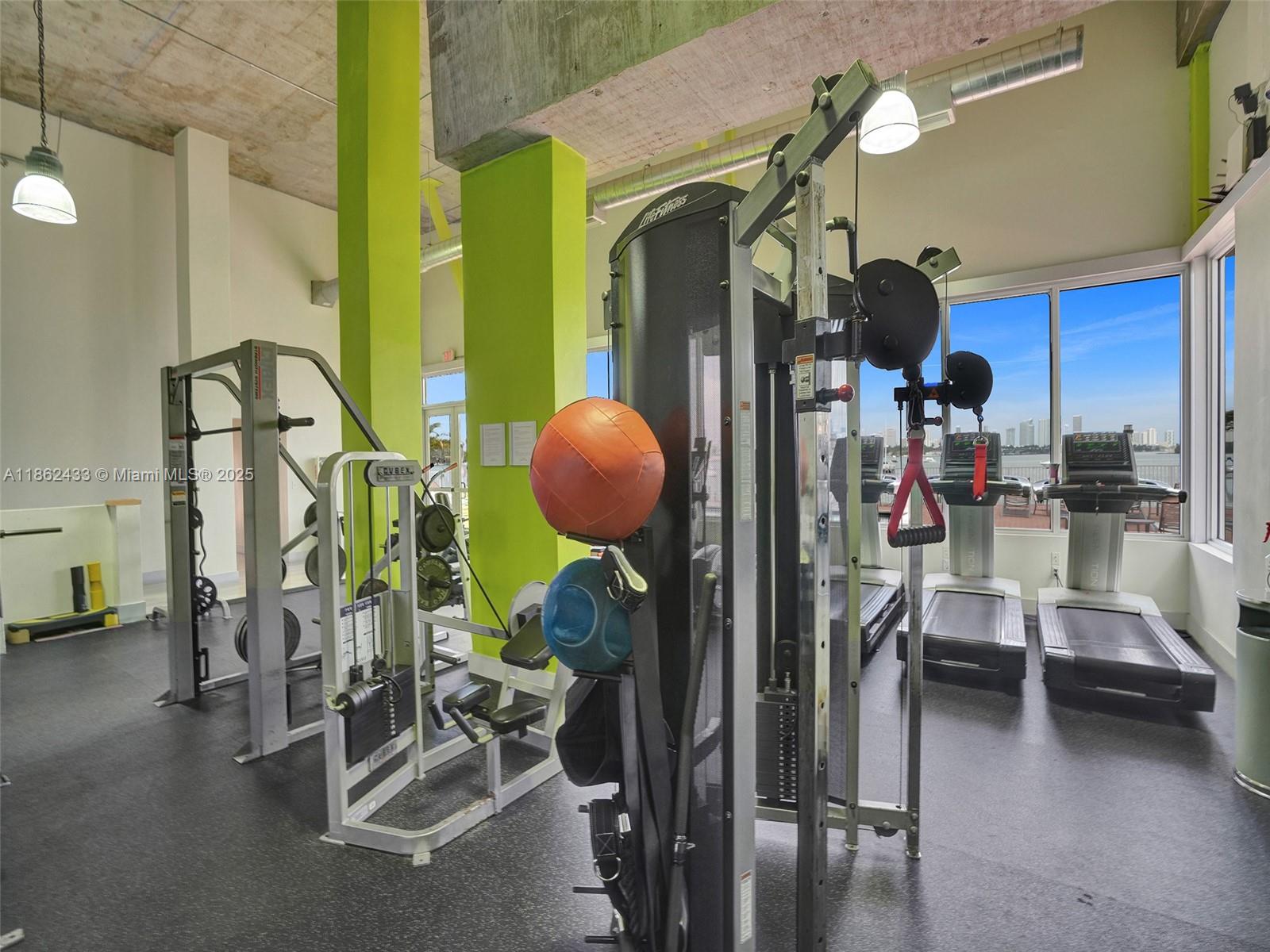 1228 West Avenue, Unit 201 Miami Beach, FL 33139 - Photo 40 of 42 a view of a room with gym equipment