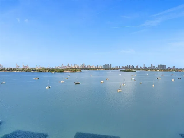 a view of a lake with a city view