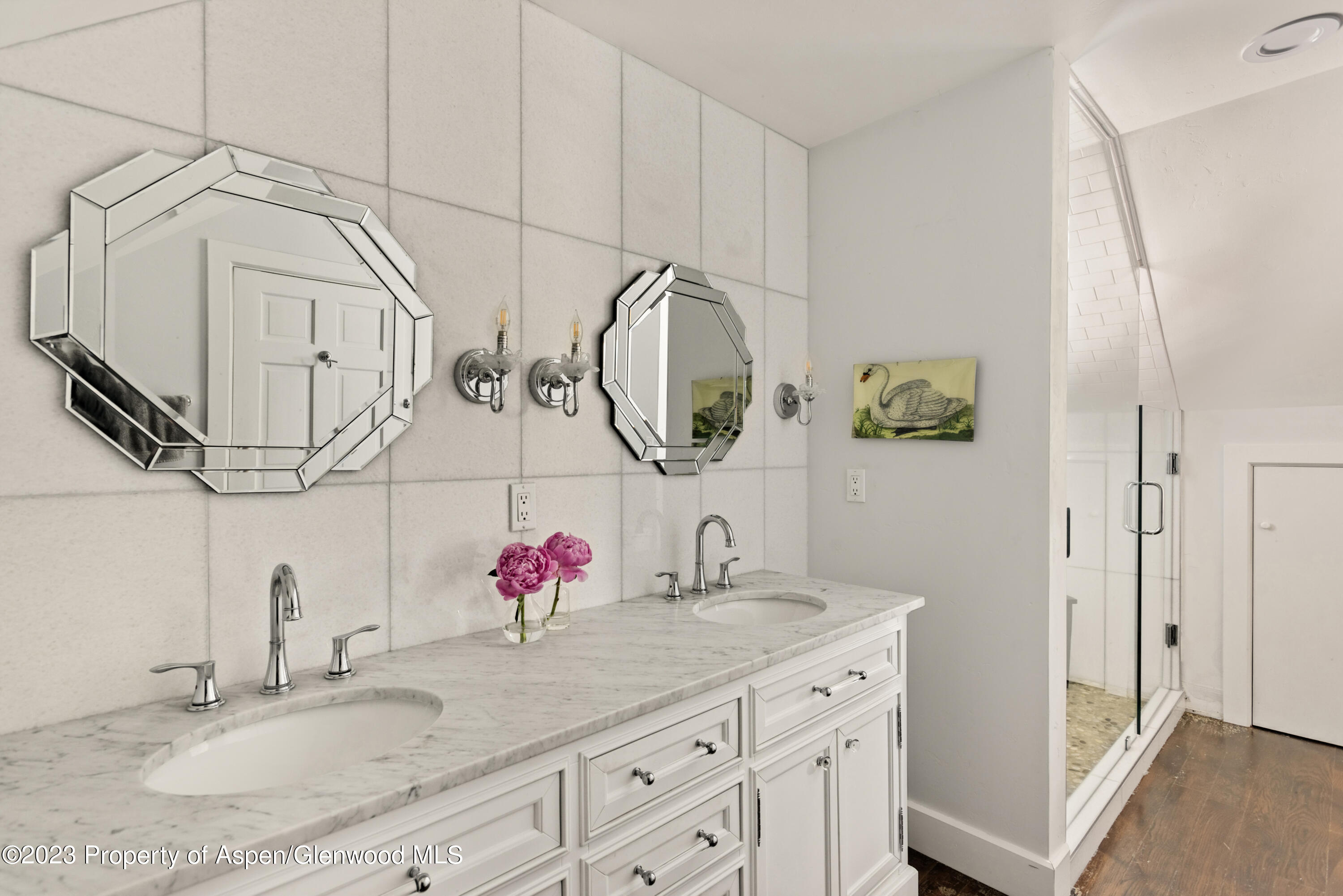 1649 Emma Spur Basalt, CO 81621 - Photo 11 of 35 a bathroom with a granite countertop sink and a mirror