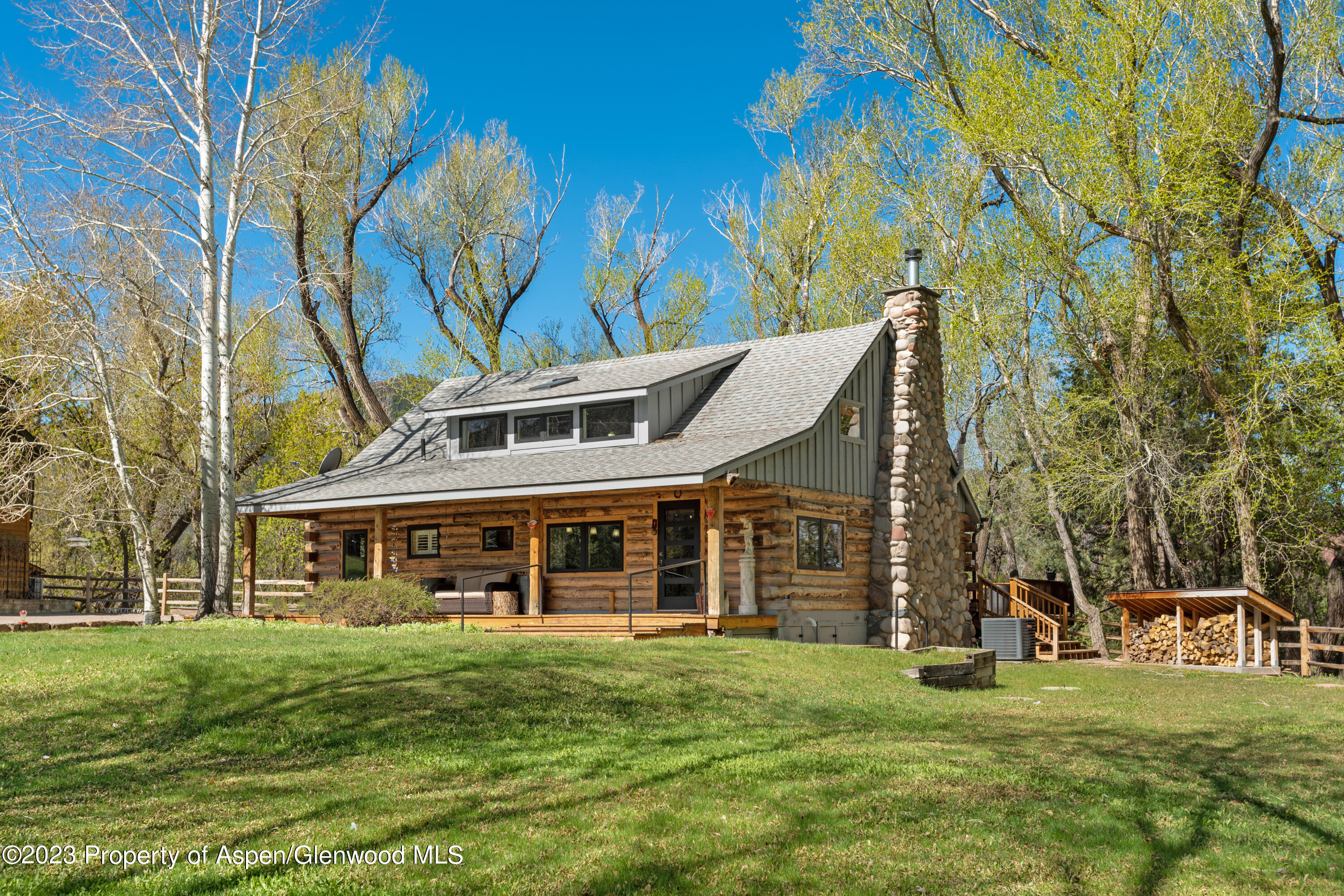 1649 Emma Spur Basalt, CO 81621 - Photo 2 of 35 a front view of a house with a garden